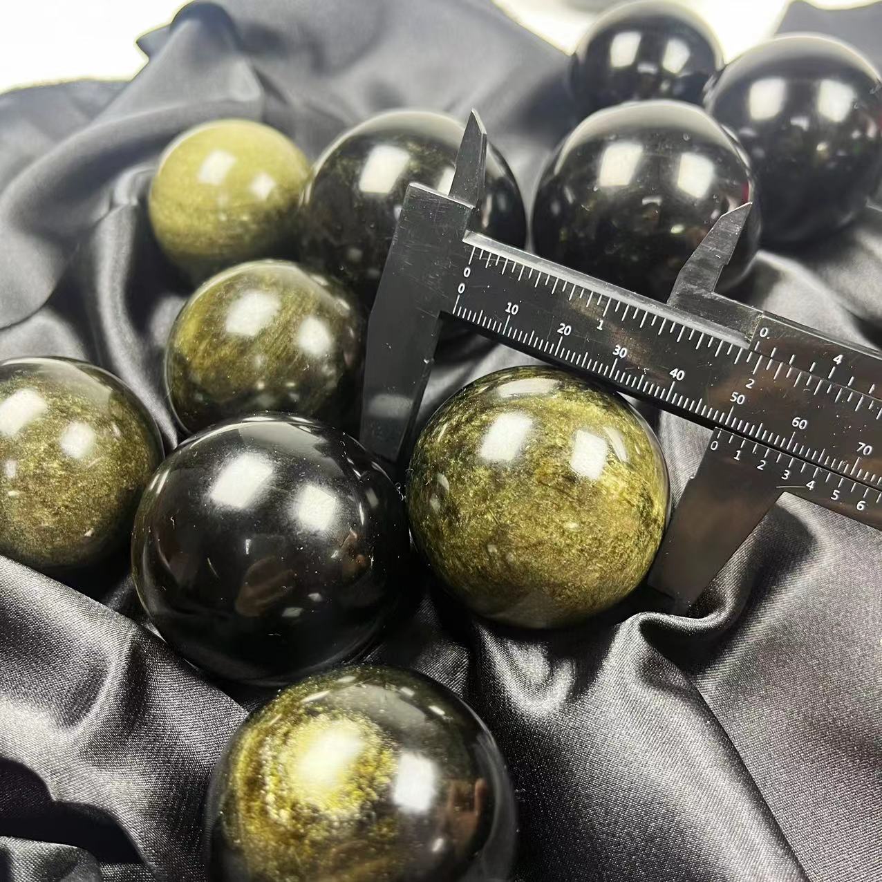 Strong Flash Golden Obsidian Spheres